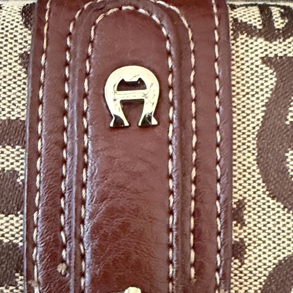 Etienne Aigner Brown and Cream Logo Wristlet